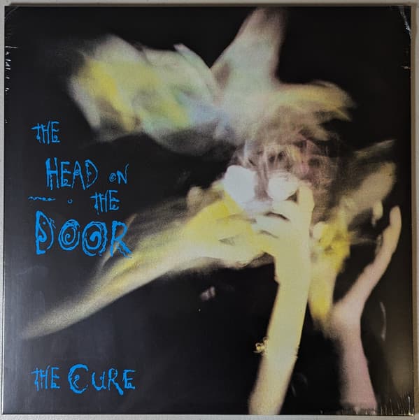 CURE, THE - THE HEAD ON THE DOOR
